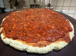Una foto de Pizza de cancha