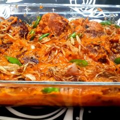 A picture of Rui maacher malai kofta(rohu fish ball curry).