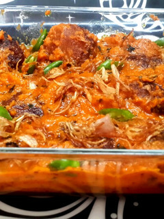 A picture of Rui maacher malai kofta(rohu fish ball curry).