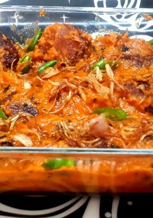 A picture of Rui maacher malai kofta(rohu fish ball curry).