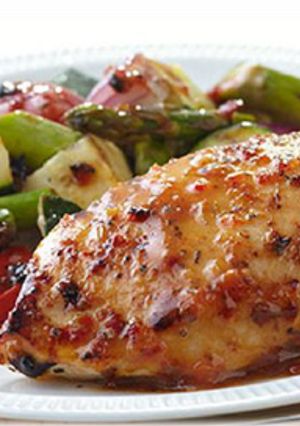 A picture of Rosemary lemon chicken with vegetables.