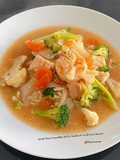 Wide Rice Noodles With Seafood in Gravy Sauce