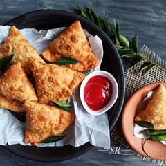 A picture of Baked Mushroom Samosa.