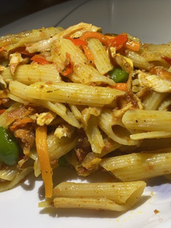A picture of Shredded chicken and beef vegetable macaroni.