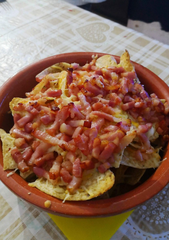 Una foto de Nachos con bacon
