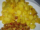 Fried potatoes with scramble egg sauce