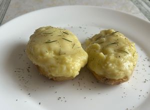 Una foto de Patates amb brandada de bacallà gratinades al forn