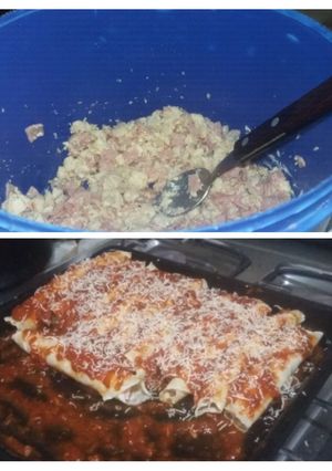 Una foto de Canelones de jamón, pollo y queso rallado