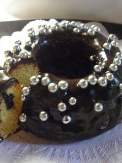 Una foto de Budín con baño de Ganache