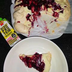A picture of Easy berry and custard  Pavlova dessert.