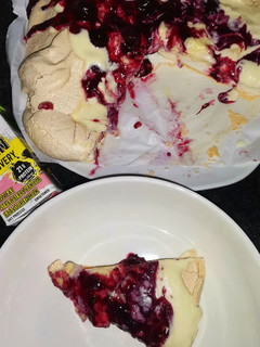 A picture of Easy berry and custard  Pavlova dessert.