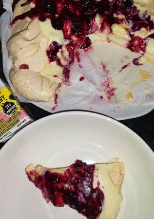 A picture of Easy berry and custard  Pavlova dessert.