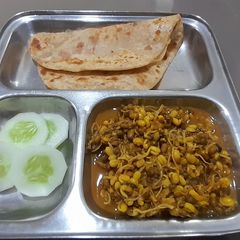 A picture of Sprouted Moong Sabji with Paratha.