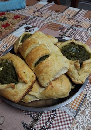 Una foto de Pancitos de acelga con ricotta