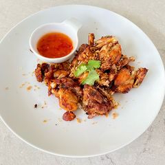 A picture of Fried Frog with Garlic and Pepper.