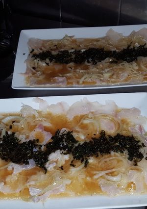 Una foto de Carpaccio de lenguado