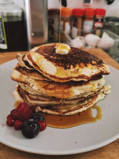Una foto de Pancakes originales con sirope de arce 🇨🇦