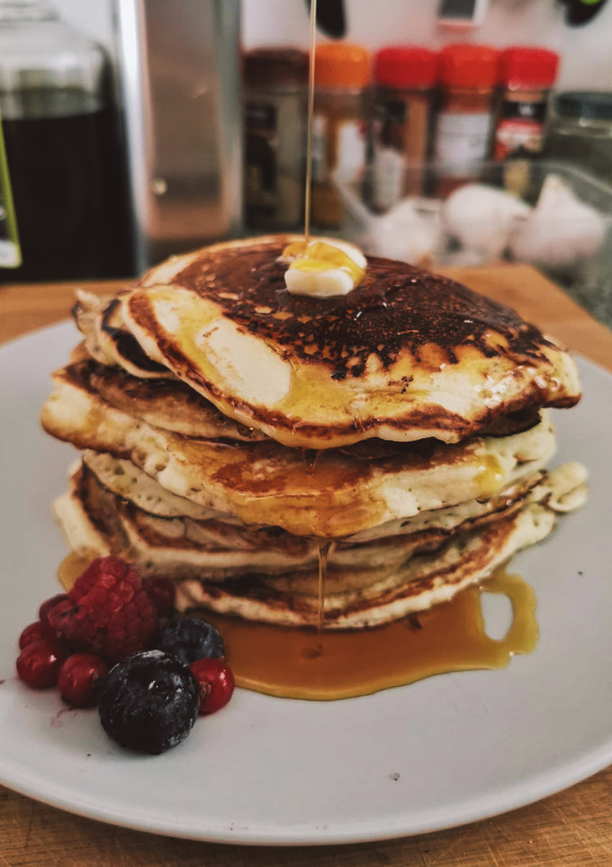 Una foto de Pancakes originales con sirope de arce 🇨🇦