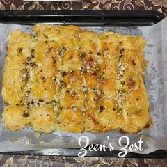 A picture of Warbath bil Ashta/Middle Eastern Cream Filled Pastries/Shabiyat.
