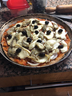 Una foto de Pizza de harina integral