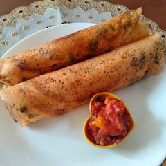 A picture of Tomato methi dosa.