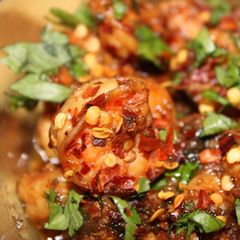 A picture of Chilli Garlic Prawns: Spicy Succulent and Sizzling.