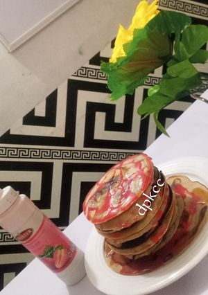 A picture of Banana strawberry pancake.