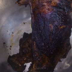 A picture of Pan roasted ribs with soy sauce and orange juice.