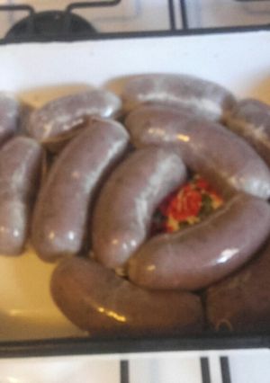 Una foto de Chorizos Caseros con hongos y tomates secos