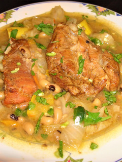A picture of Black eye peas with roasted pork spareribs.