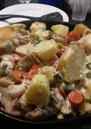 Una foto de Abadejo con batata y zanahorias con salsa blanca y verdeo