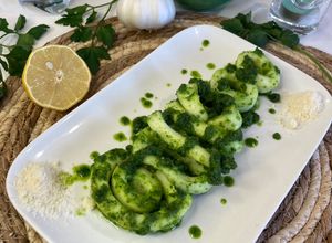 Une photo de Calamars en persillade