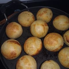 A picture of Baati in appe pan.