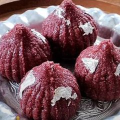 A picture of Red Velvet Coconut Modak.