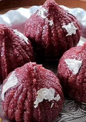 A picture of Red Velvet Coconut Modak.