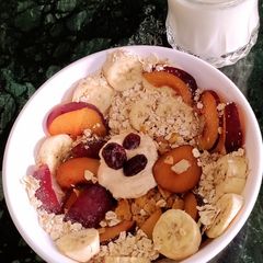 A picture of Muesli with Plums and Banana.