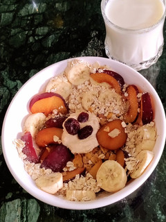 A picture of Muesli with Plums and Banana.