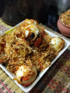 A picture of Paneer and Egg Biryani.
