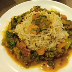 A picture of Simple rice with veggies.