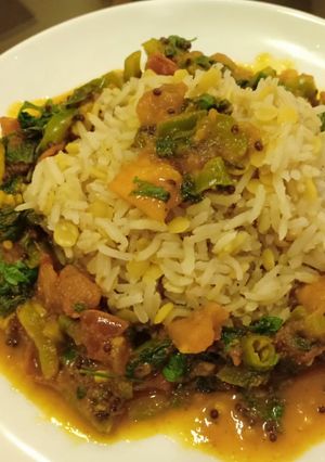 A picture of Simple rice with veggies.
