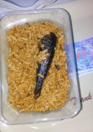 A picture of Jolllof Rice and fish.