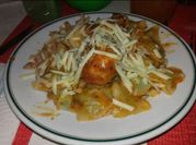 Una foto de ravioles de pollo y ricota