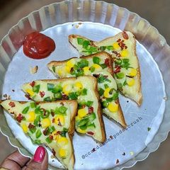 Cheese corn breadizza A picture of Cheese corn breadizza.