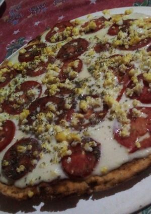 Una foto de Pizza casera amasada