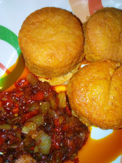 A picture of Moi moi with sauce.