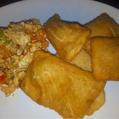 A picture of Patira with egg sauce.