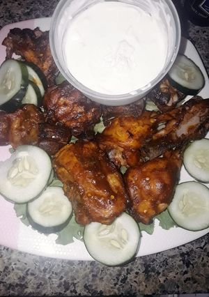 A picture of Nigeria Berbecue chicken style with garlic sauce.