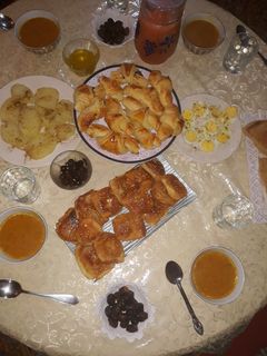 صورة لوصفة رغايف مقرمشين بالزنجلان والنافع 😋😋