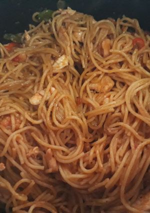 A picture of Pasta with shredded chicken.