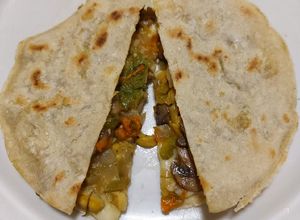 Una foto de Quesadilla de flor con champiñones